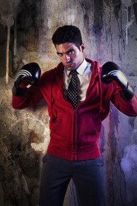 View of a well dressed fighter with boxing gloves.